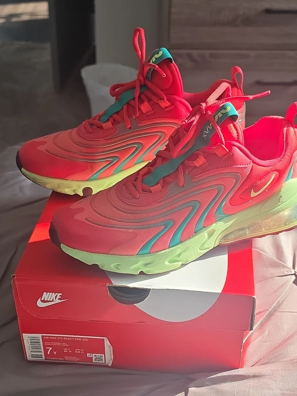 Nike Kids Red Sneakers with Teal Tongue Detail